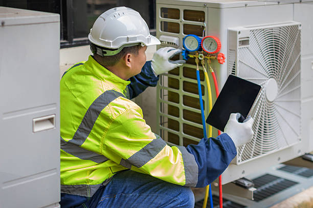 Professional Air Conditioning Repair technician working in Eaton, OH